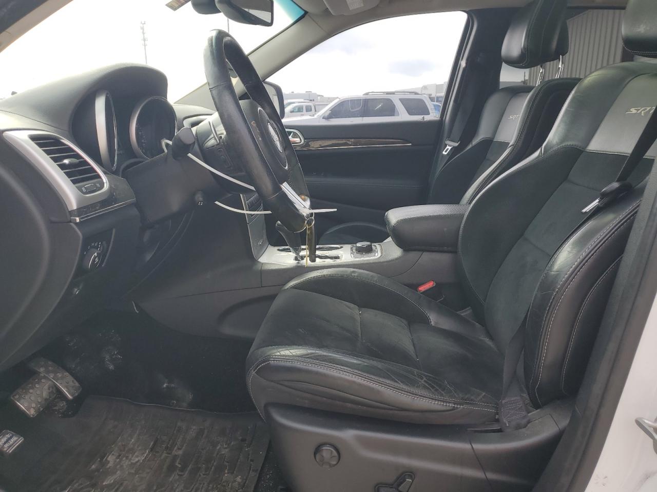 2013 Jeep Grand Cherokee VIN 1C4RJFDJ2DC586117 Copart auction photo, all over damage thumbnail 7