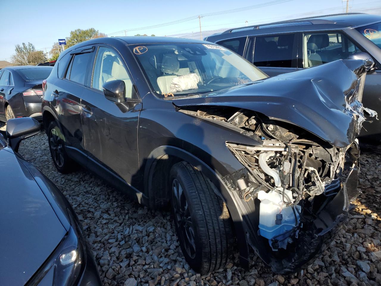 2016 Mazda CX-5 VIN JM3KE4DYXG0885407 Copart auction photo, front end damage thumbnail 4