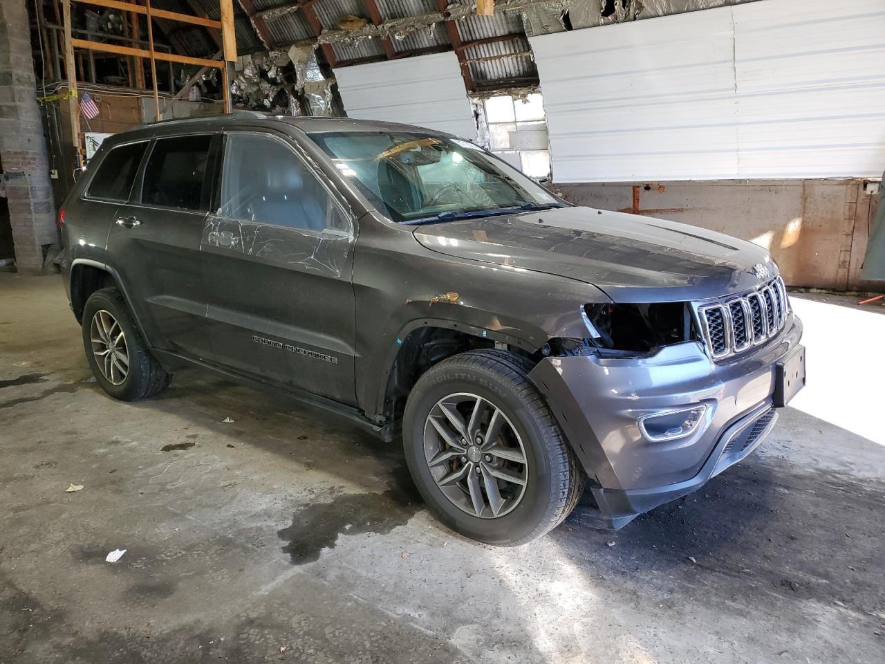 2018 Jeep Grand Cherokee VIN 1C4RJFBG6JC390930 Copart auction photo, front end / side damage thumbnail 4