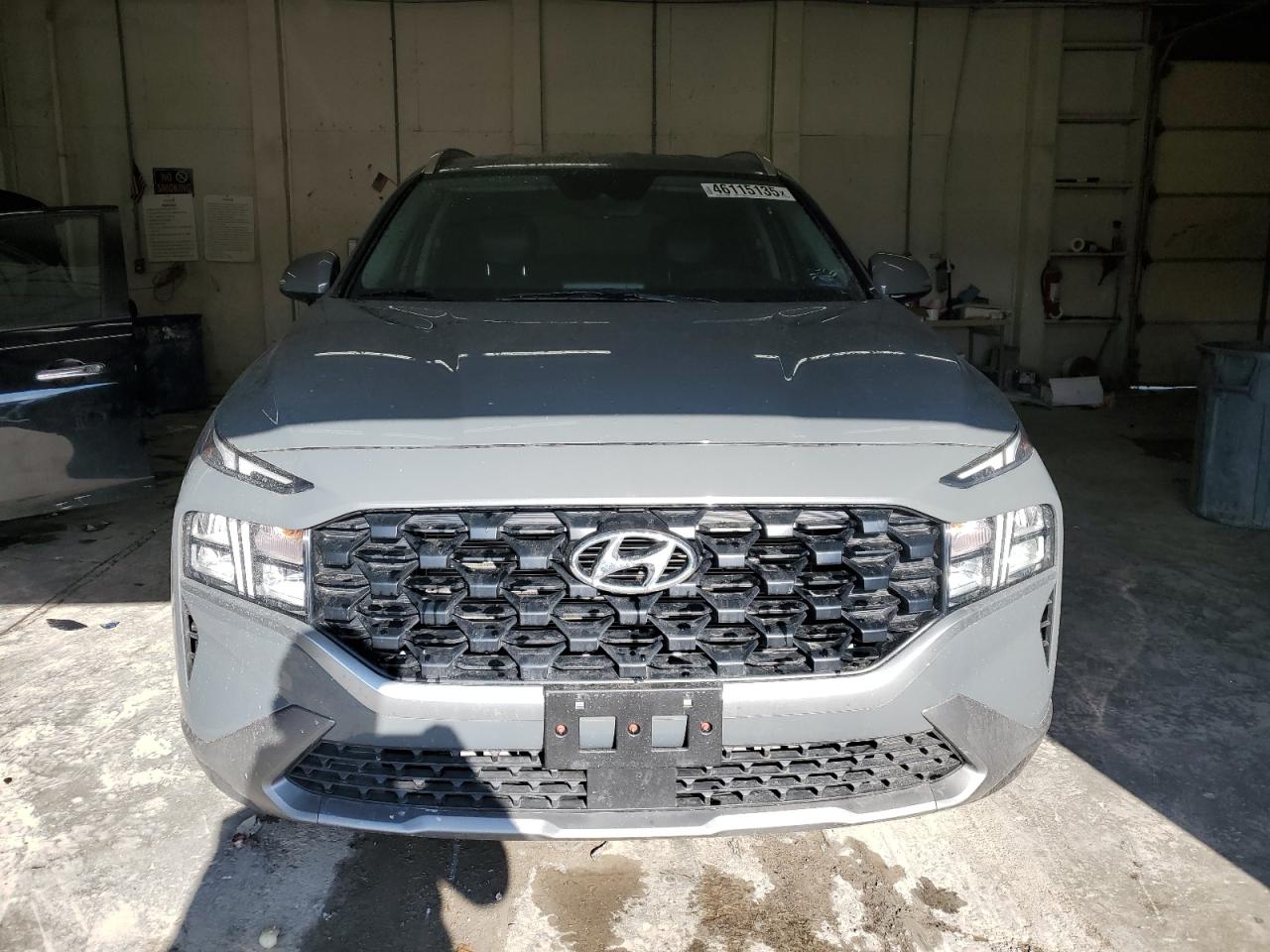 2023 Hyundai Santa Fe VIN 5NMS24AJ9PH634807 Copart auction photo, rear end / minor dent/scratches damage thumbnail 5