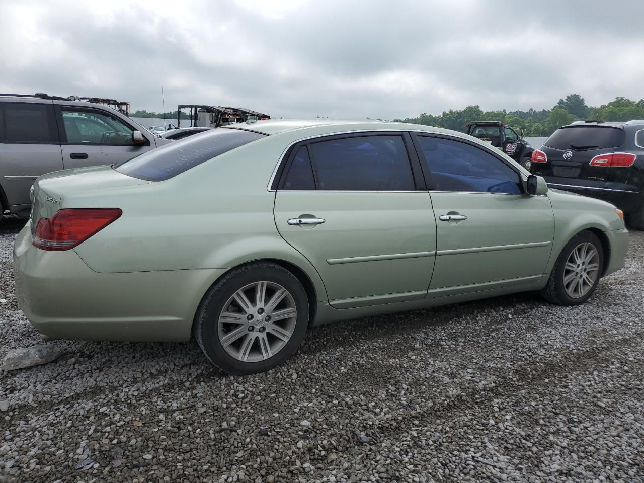 2009 Toyota Avalon VIN 4T1BK36BX9U327651 Copart auction photo, side / rear end damage thumbnail 3
