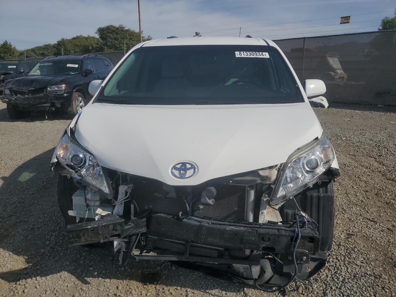 2015 Toyota Sienna VIN 5TDKK3DC3FS640198 Copart auction photo, front end damage thumbnail 5