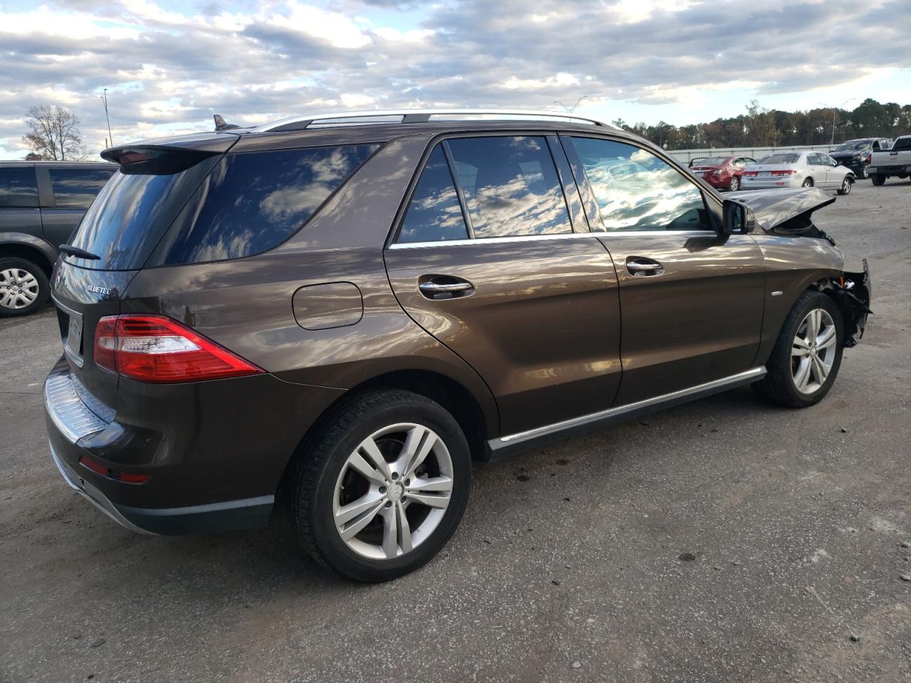 2012 Mercedes-Benz M-klasse VIN 4JGDA2EB3CA053080 Copart auction photo, front end damage thumbnail 3