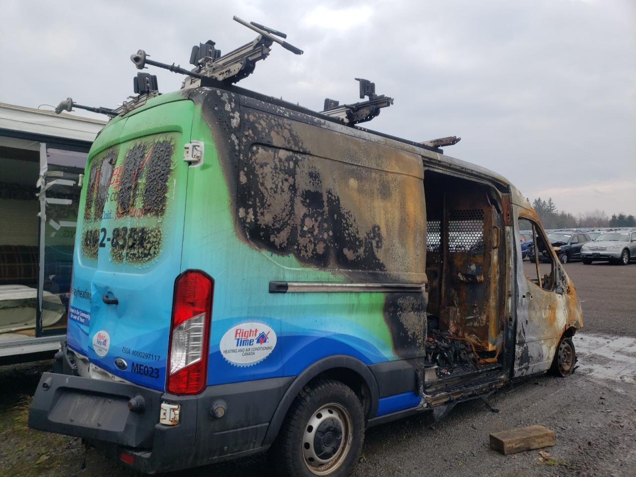 2017 Ford Transit VIN 1FTYR2CM2HKA12850 Copart auction photo, burn damage thumbnail 4
