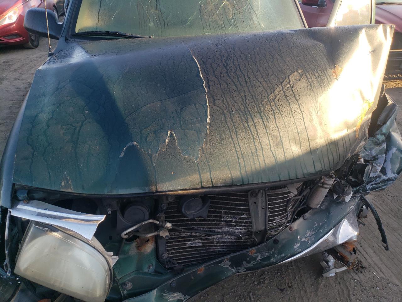 2001 Toyota Tacoma VIN 5TEVL52N11Z807650 Copart auction photo, front end / undercarriage damage thumbnail 11