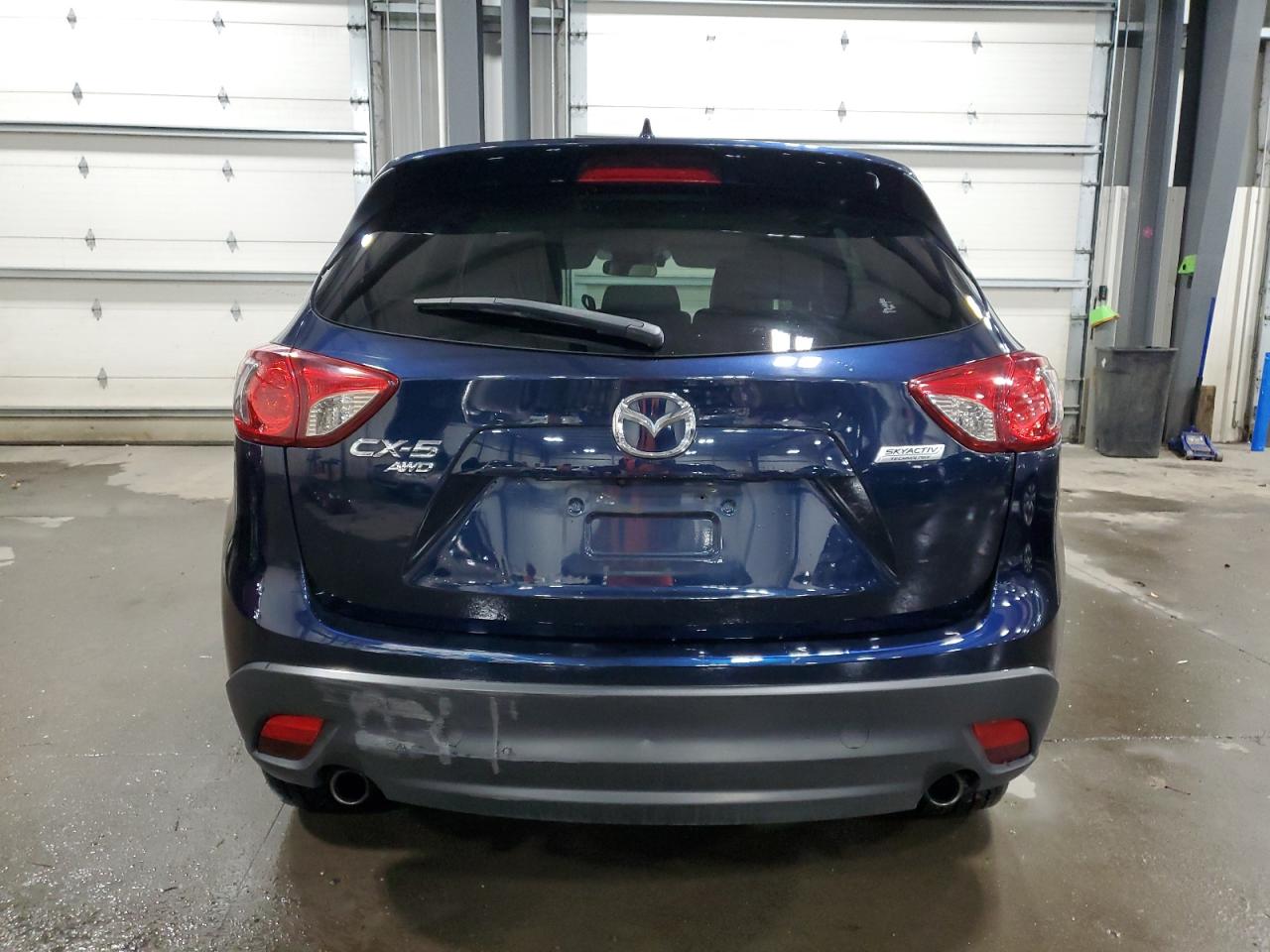 2016 Mazda CX-5 VIN JM3KE4DYXG0785145 Copart auction photo, side / front end damage thumbnail 6