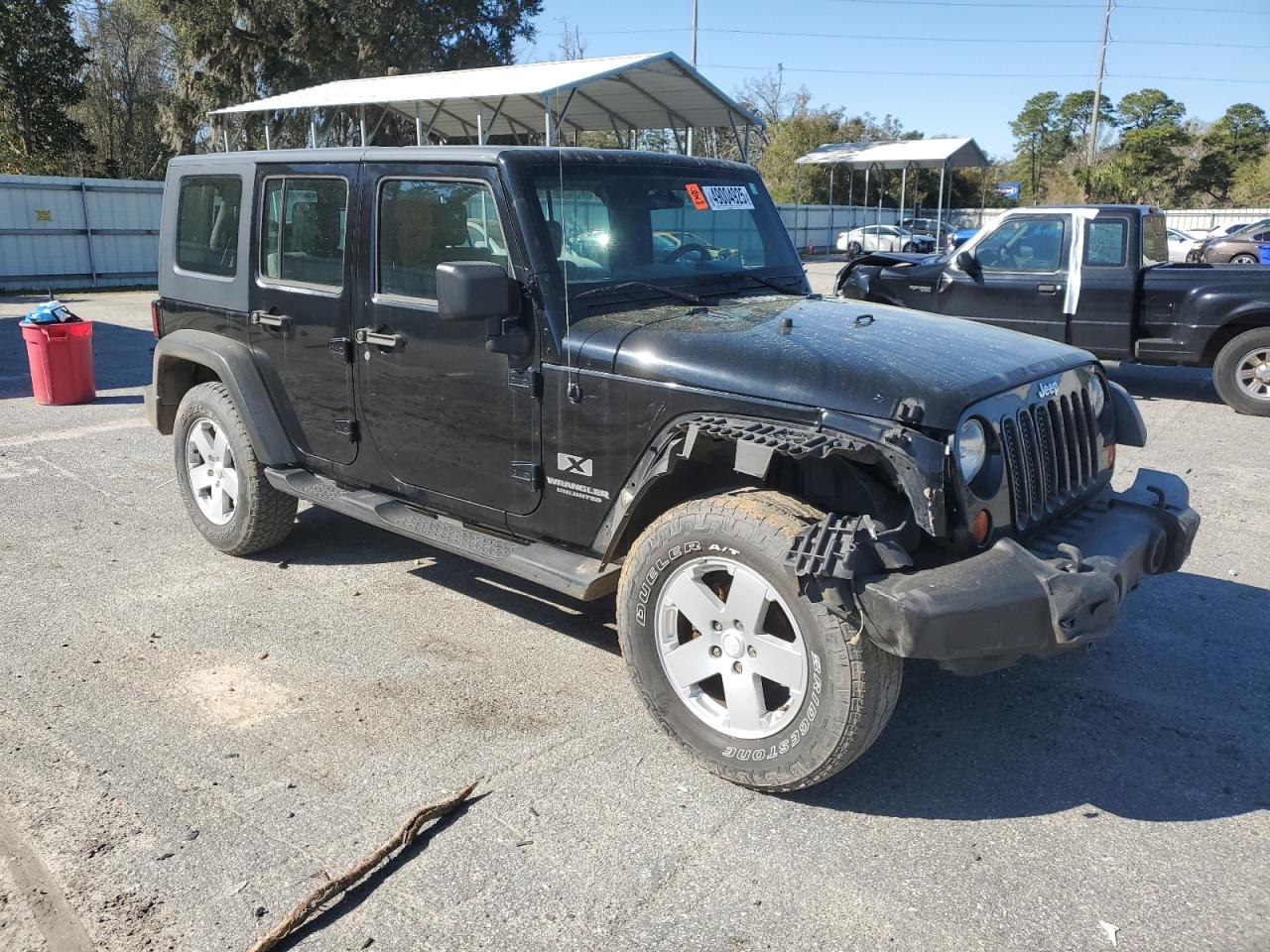 2009 Jeep Wrangler VIN 1J4GA391X9L788932 Copart auction photo, front end damage thumbnail 4