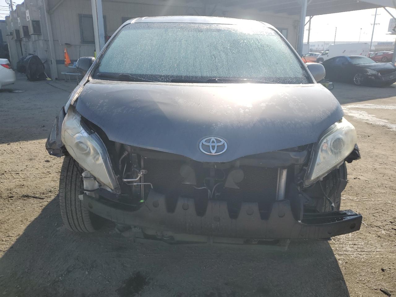 2012 Toyota Sienna VIN 5TDKK3DC2CS212599 Copart auction photo, front end damage thumbnail 5