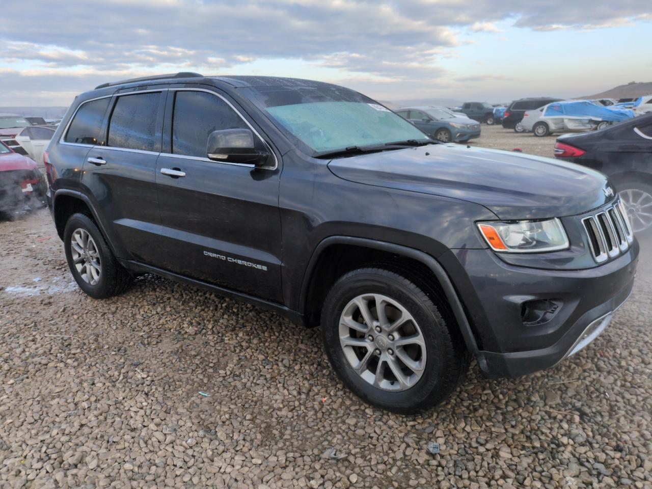 2014 Jeep Grand Cherokee VIN 1C4RJFBG9EC469983 Copart auction photo, side damage thumbnail 4