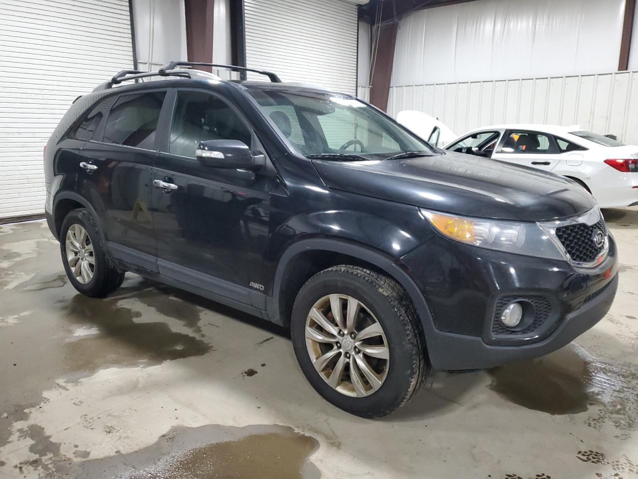 2011 KIA Sorento VIN 5XYKUDA21BG055087 Copart auction photo, normal wear damage thumbnail 4