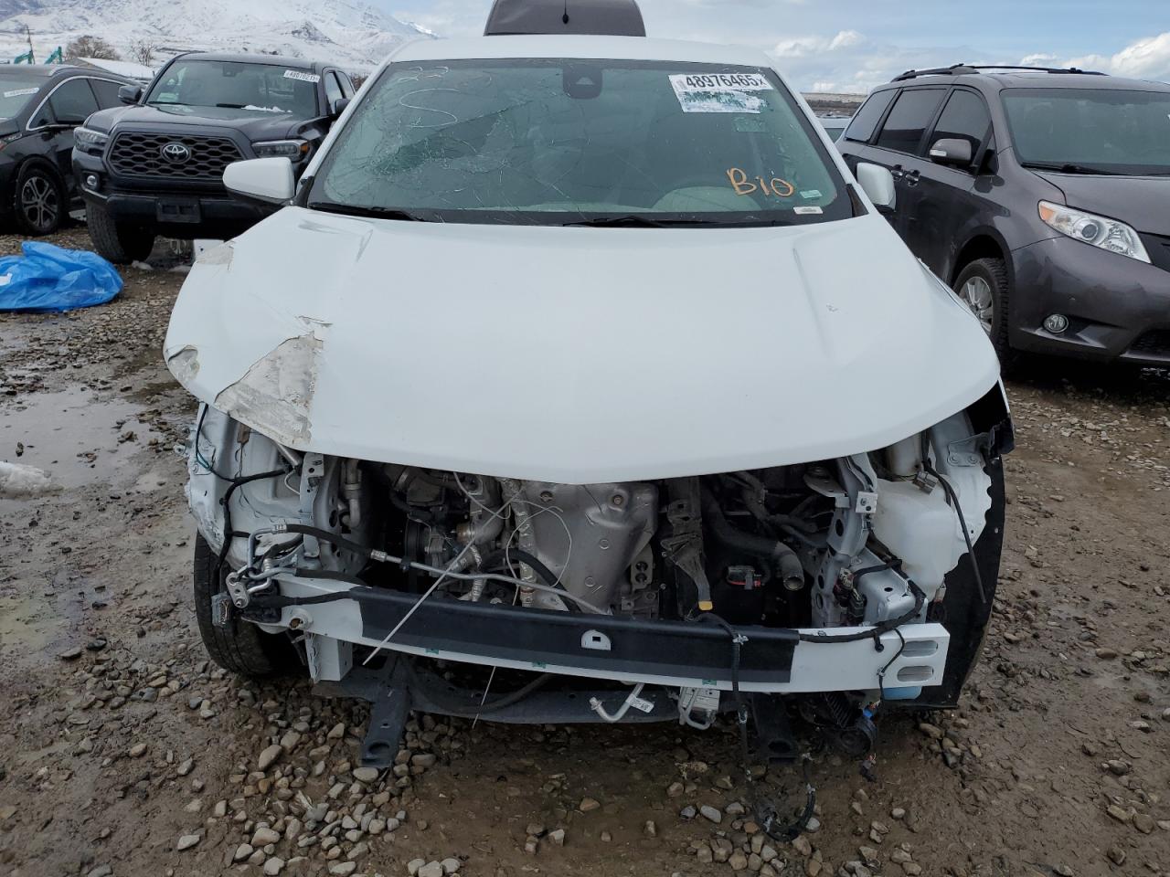 2021 Chevrolet Equinox VIN 2GNAXKEV4M6105208 Copart auction photo, front end / side damage thumbnail 5