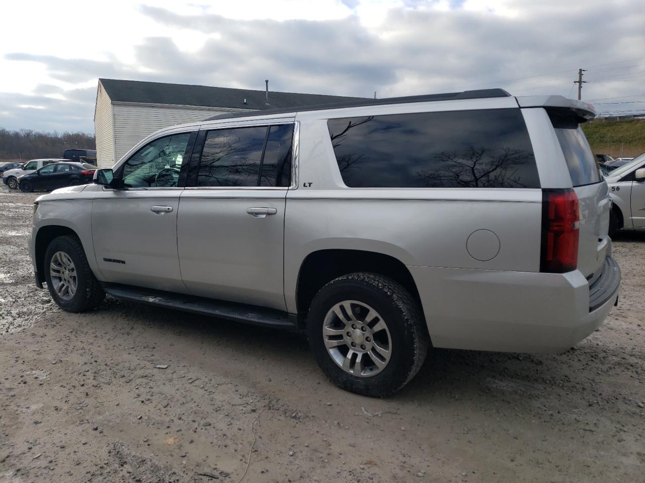 2017 Chevrolet Suburban VIN 1GNSKHKC5HR114258 Copart auction photo, front end / side damage thumbnail 2