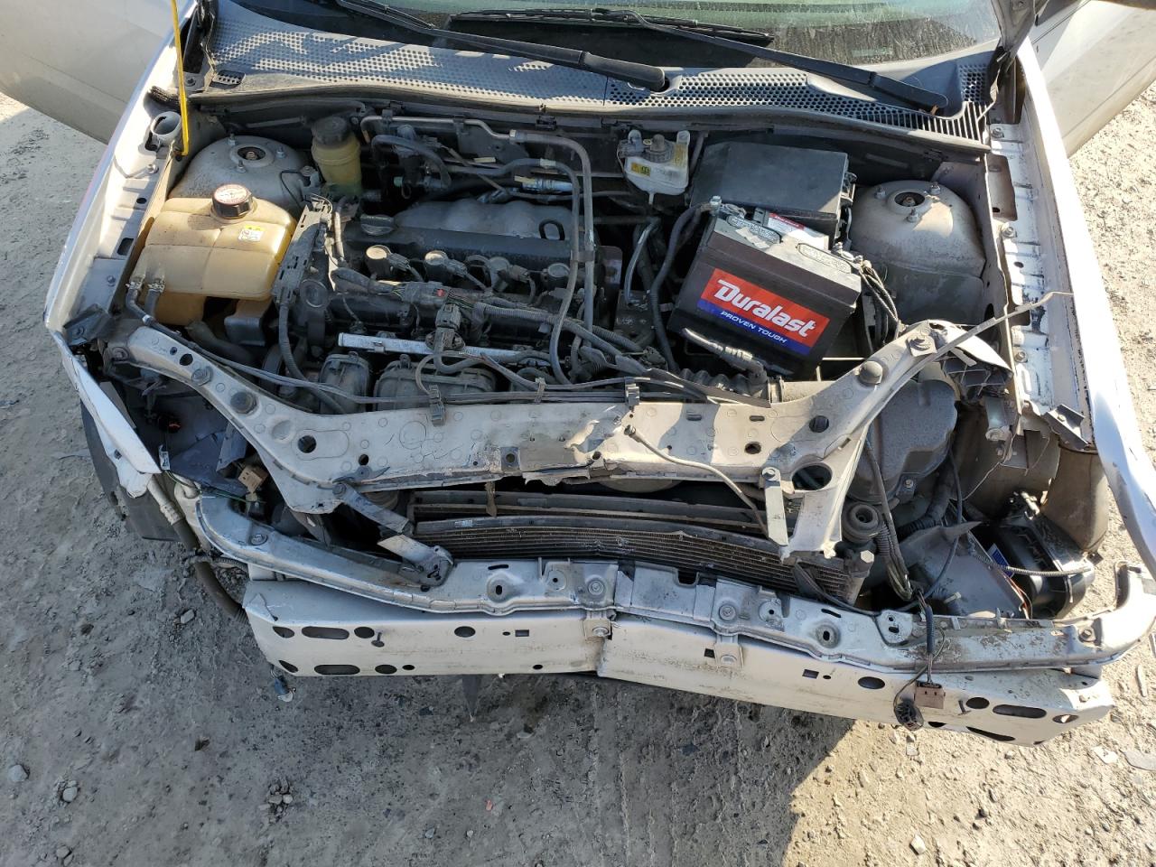 2005 Ford Focus VIN 3FAFP31N85R111927 Copart auction photo, front end / side damage thumbnail 12
