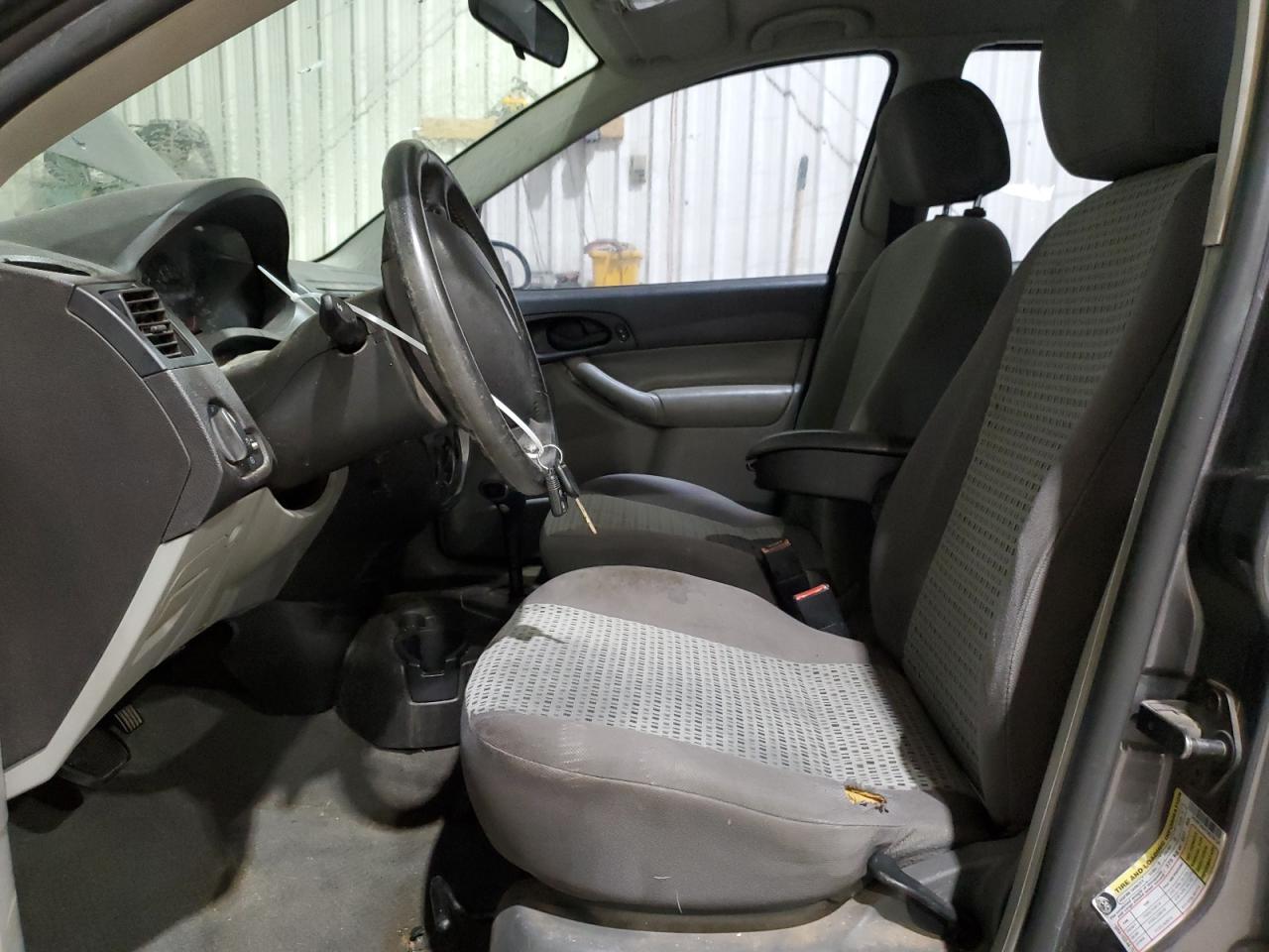 2007 Ford Focus VIN 1FAHP34N47W239134 Copart auction photo, front end / side damage thumbnail 7