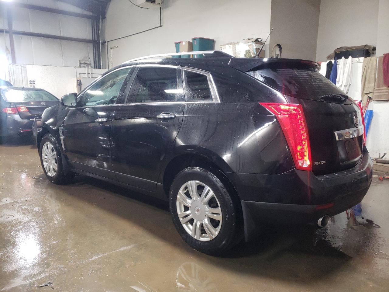 2012 Cadillac SRX VIN 3GYFNAE34CS643379 Copart auction photo, front end / side damage thumbnail 2