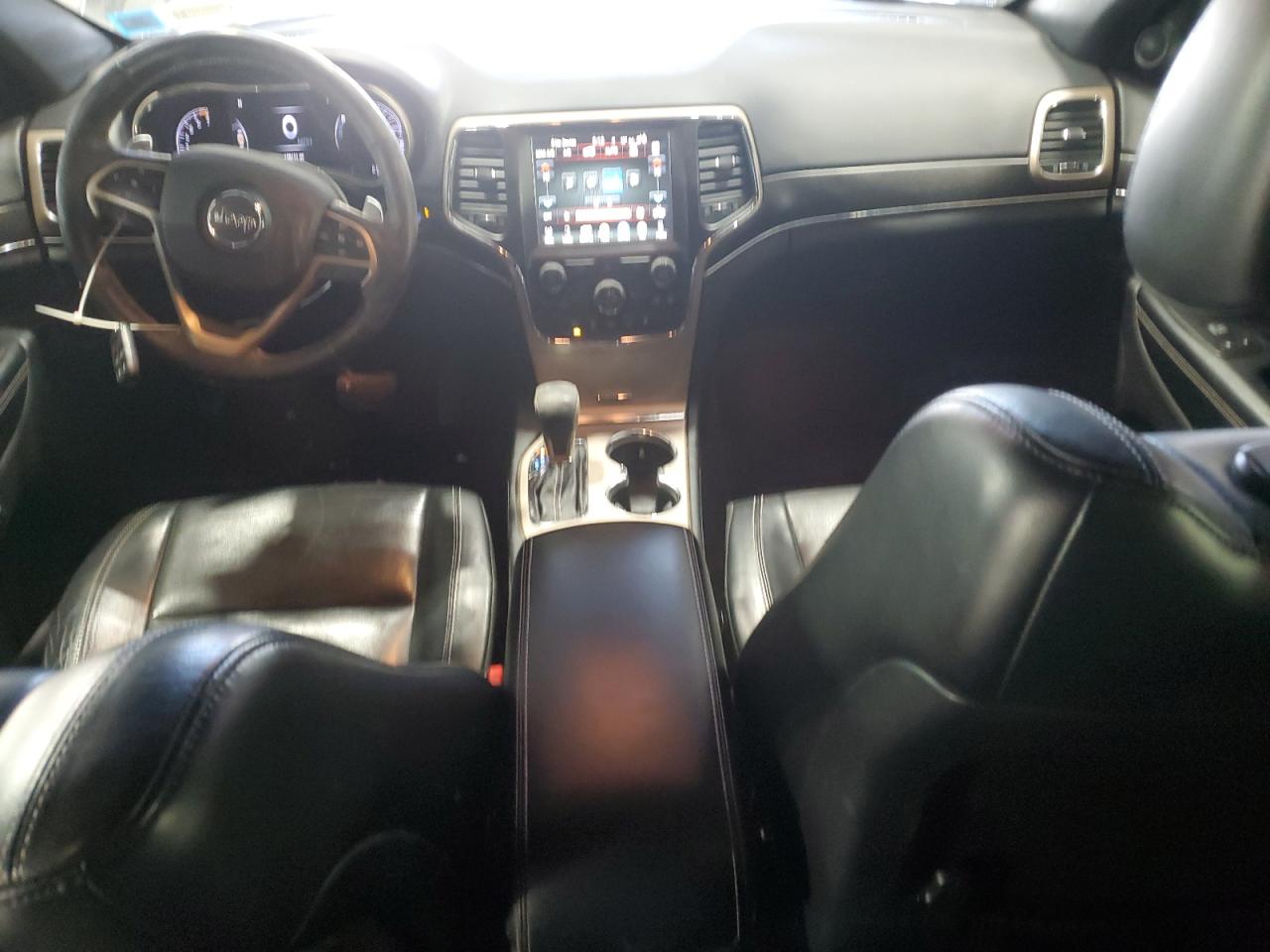 2017 Jeep Grand Cherokee VIN 1C4RJFBG2HC698946 Copart auction photo, side / rear end damage thumbnail 8