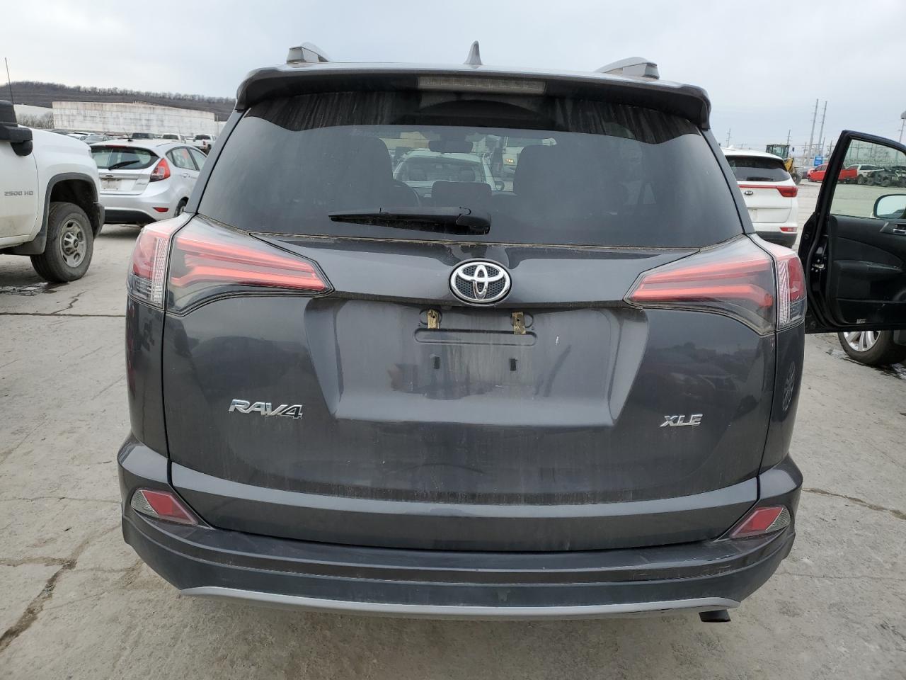 2018 Toyota RAV 4 VIN 2T3WFREV7JW506875 Copart auction photo, side / rear end damage thumbnail 6
