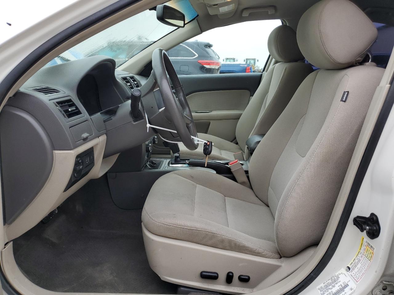 2012 Ford Fusion VIN 3FADP0L33CR447483 Copart auction photo, front end / hail damage thumbnail 7