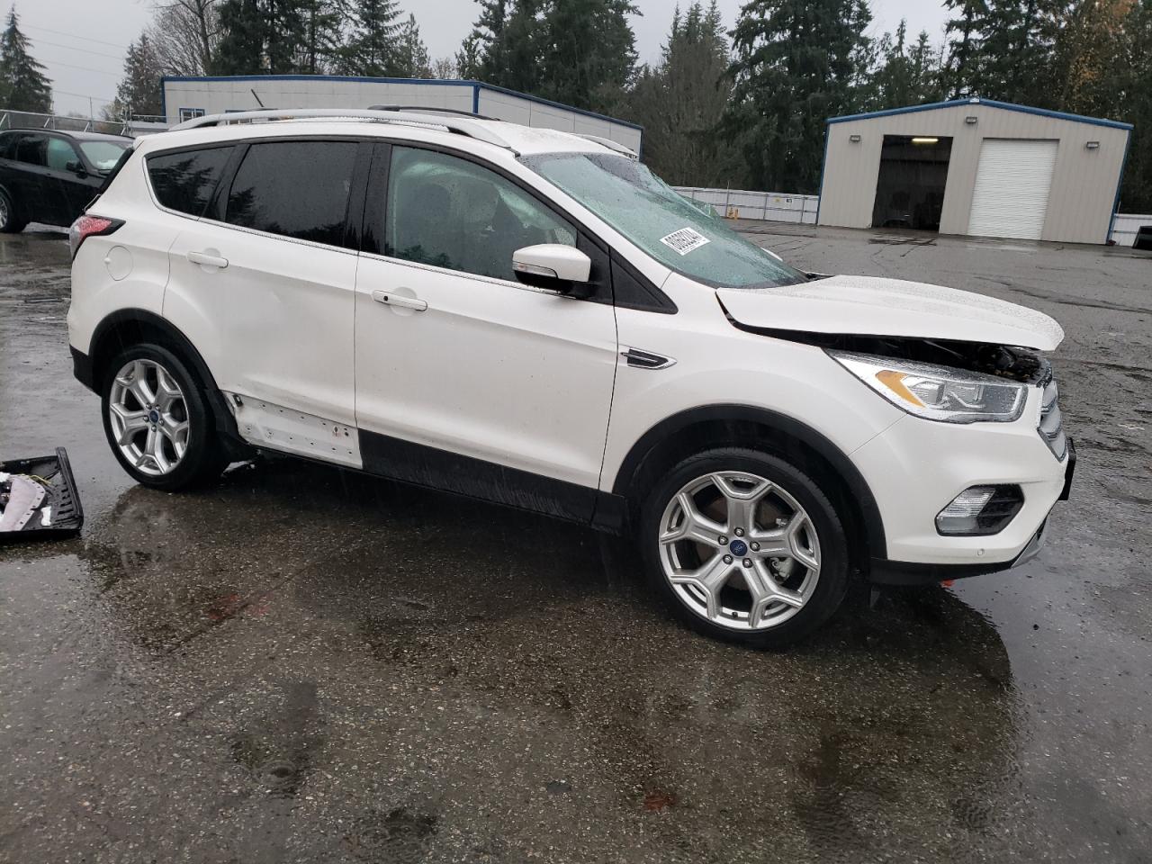 2018 Ford Escape VIN 1FMCU9J93JUA42803 Copart auction photo, rollover damage thumbnail 4