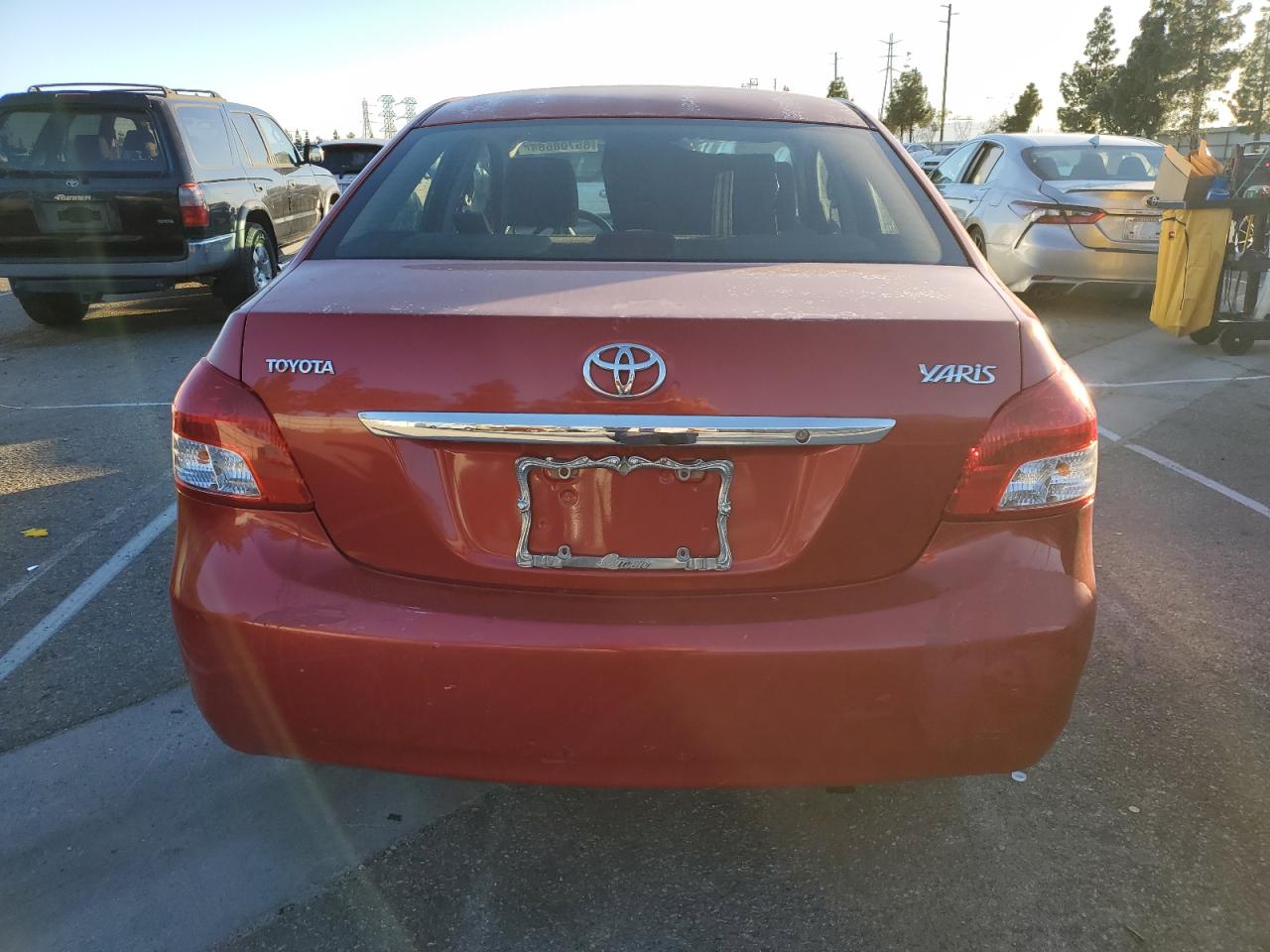 2011 Toyota Yaris VIN JTDBT4K35B4084519 Copart auction photo, front end / rear end damage thumbnail 6