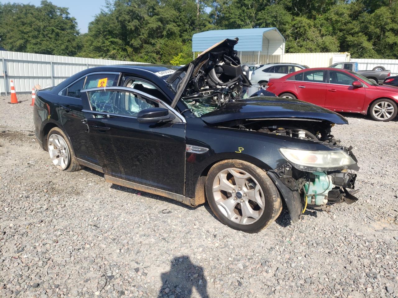 2011 Ford Taurus VIN 1FAHP2EWXBG168624 Copart auction photo, all over damage thumbnail 4