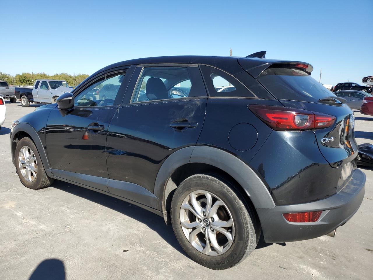 2021 Mazda CX-3 VIN JM1DKDB74M1507092 Copart auction photo, side / rear end damage thumbnail 2