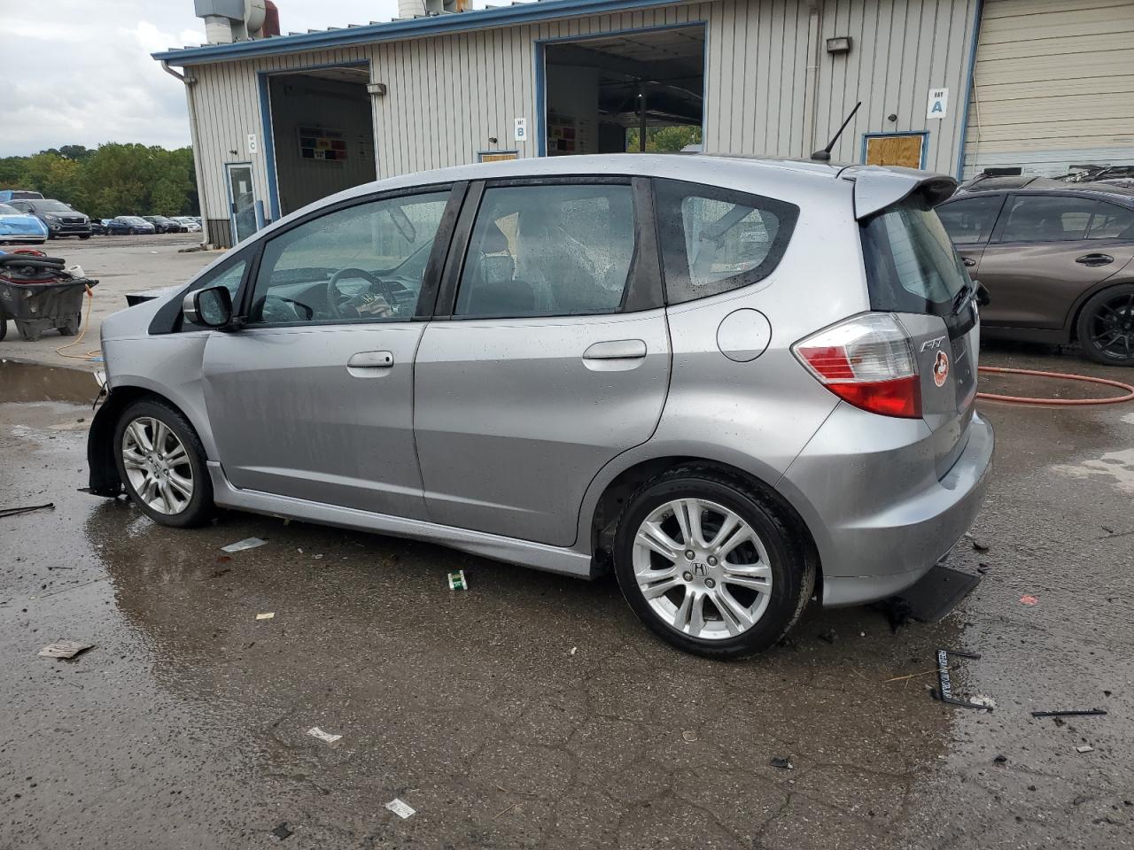 2010 Honda Fit VIN JHMGE8H47AS007733 Copart auction photo, front end / minor dent/scratches damage thumbnail 2