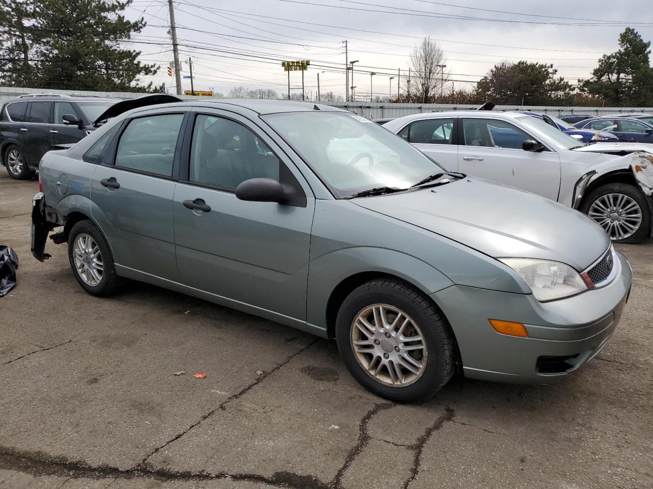 2006 Ford Focus VIN 1FAFP34N46W179989 Copart auction photo, rear end / front end damage thumbnail 4