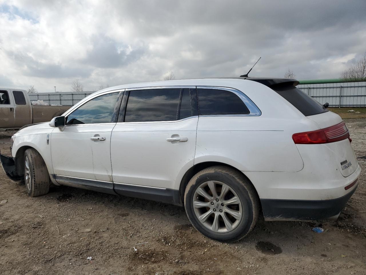 2014 Lincoln MKT VIN 2LMHJ5FK3EBL54865 Copart auction photo, front end / side damage thumbnail 2
