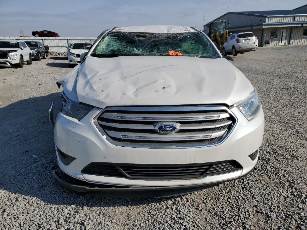 2015 Ford Taurus VIN 1FAHP2E87FG114124 Copart auction photo, all over / water/flood damage thumbnail 5