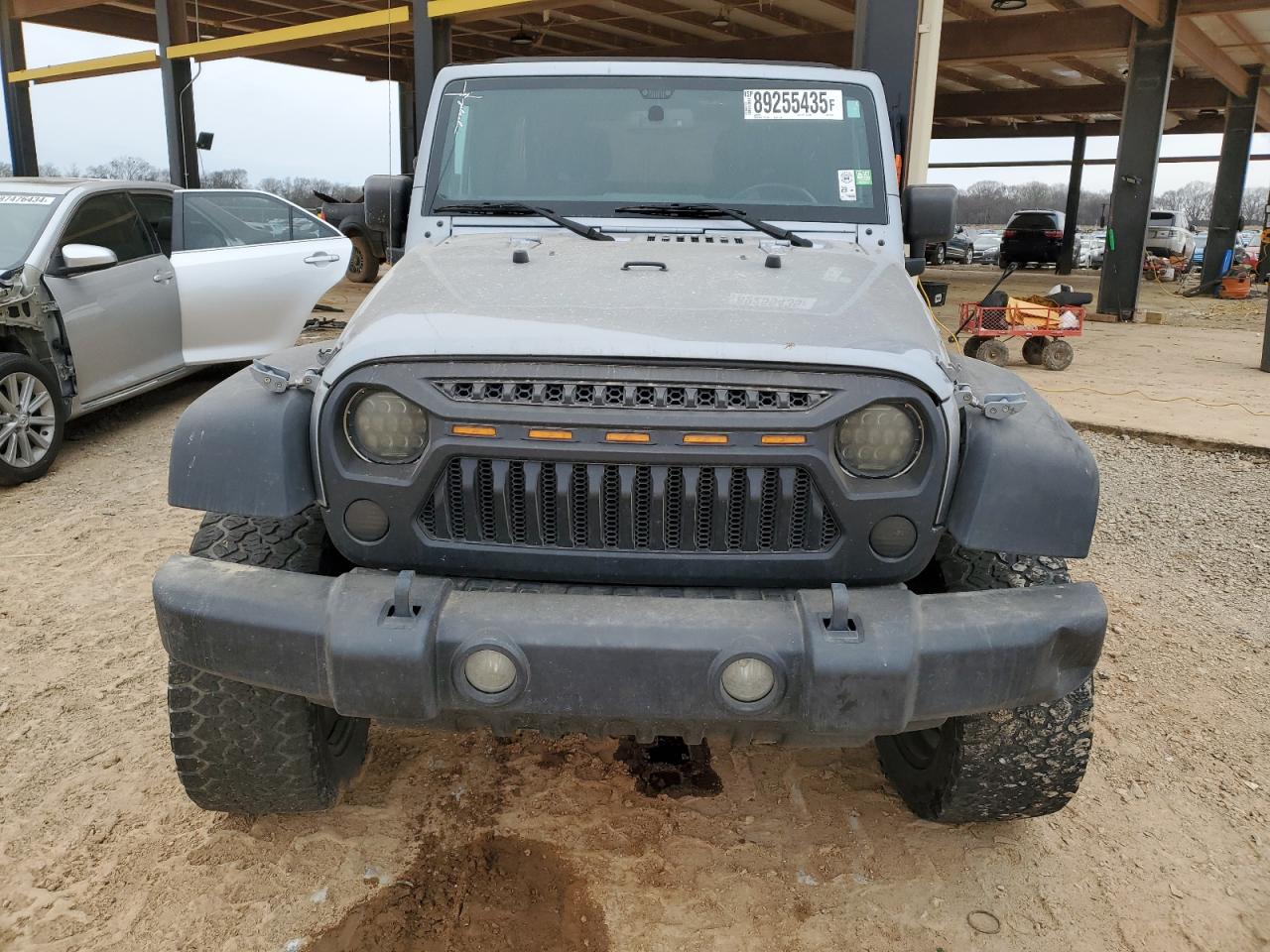 2016 Jeep Wrangler VIN 1C4BJWFG3GL257613 Copart auction photo, side / undercarriage damage thumbnail 5
