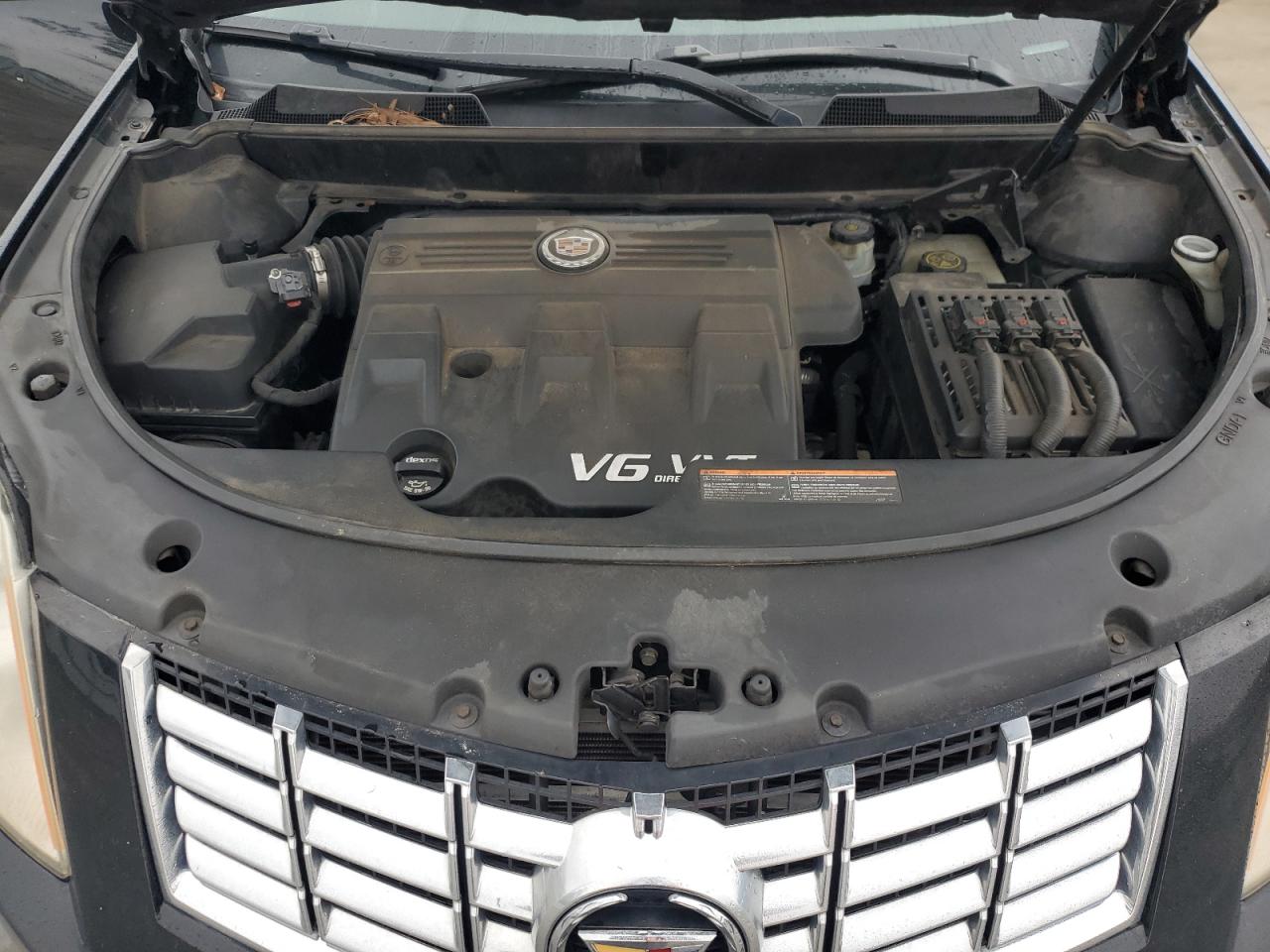 2013 Cadillac SRX VIN 3GYFNAE33DS518293 Copart auction photo, biohazard/chemical / minor dent/scratches damage thumbnail 12