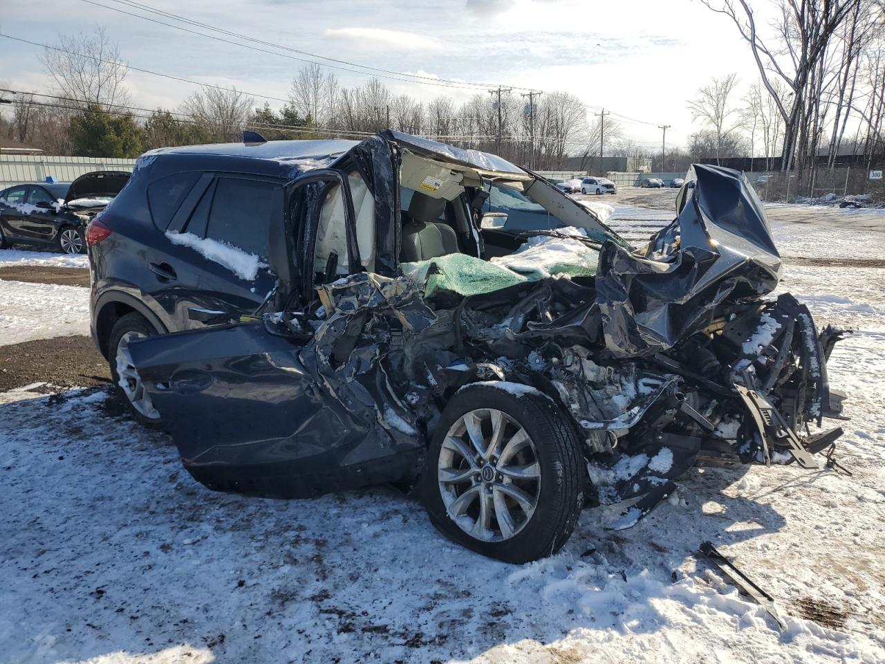 2015 Mazda CX-5 VIN JM3KE4DY7F0549504 Copart auction photo, front end / side damage thumbnail 4