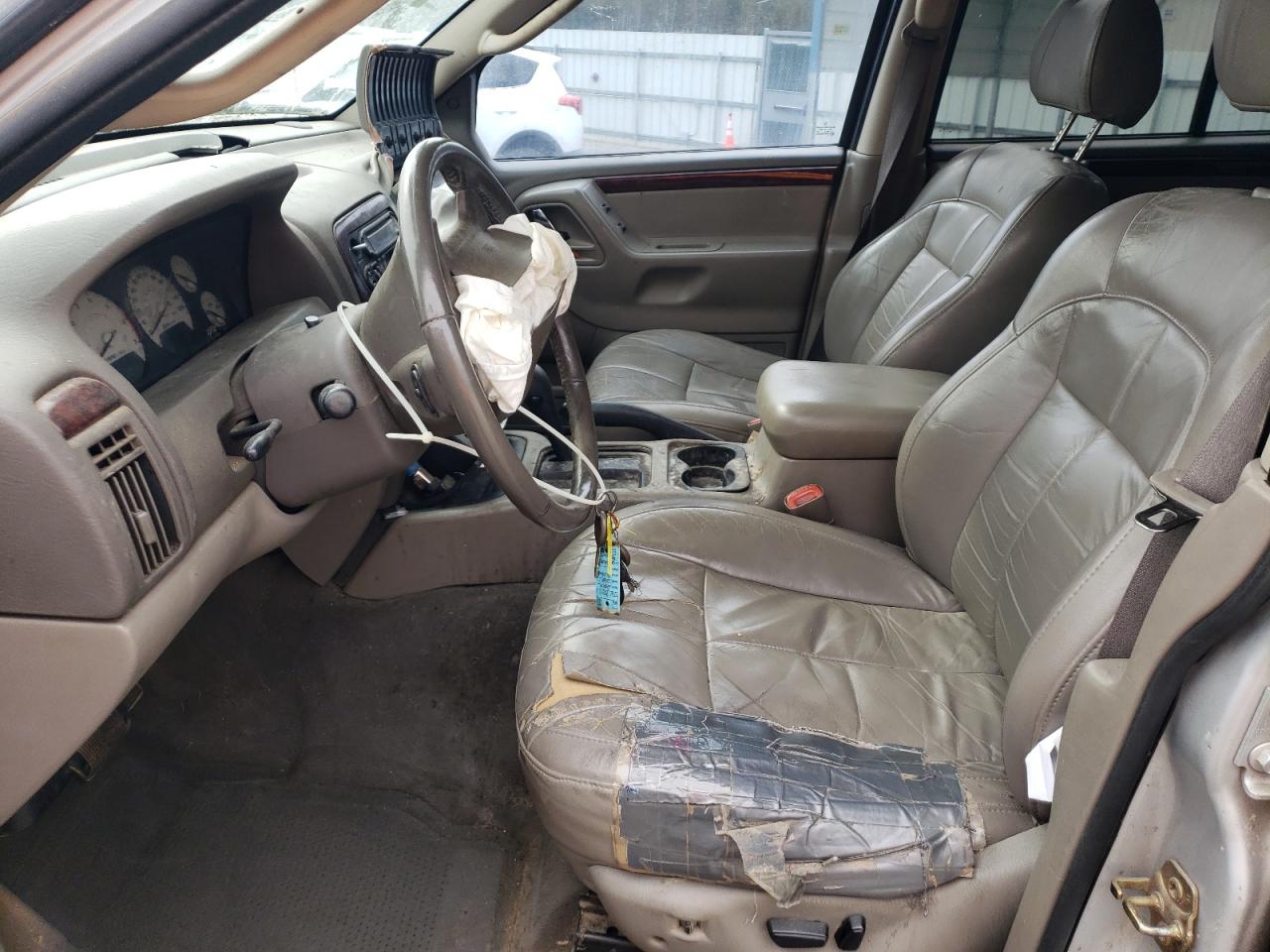 2004 Jeep Grand Cherokee VIN 1J4GX58N64C139877 Copart auction photo, side / undercarriage damage thumbnail 7