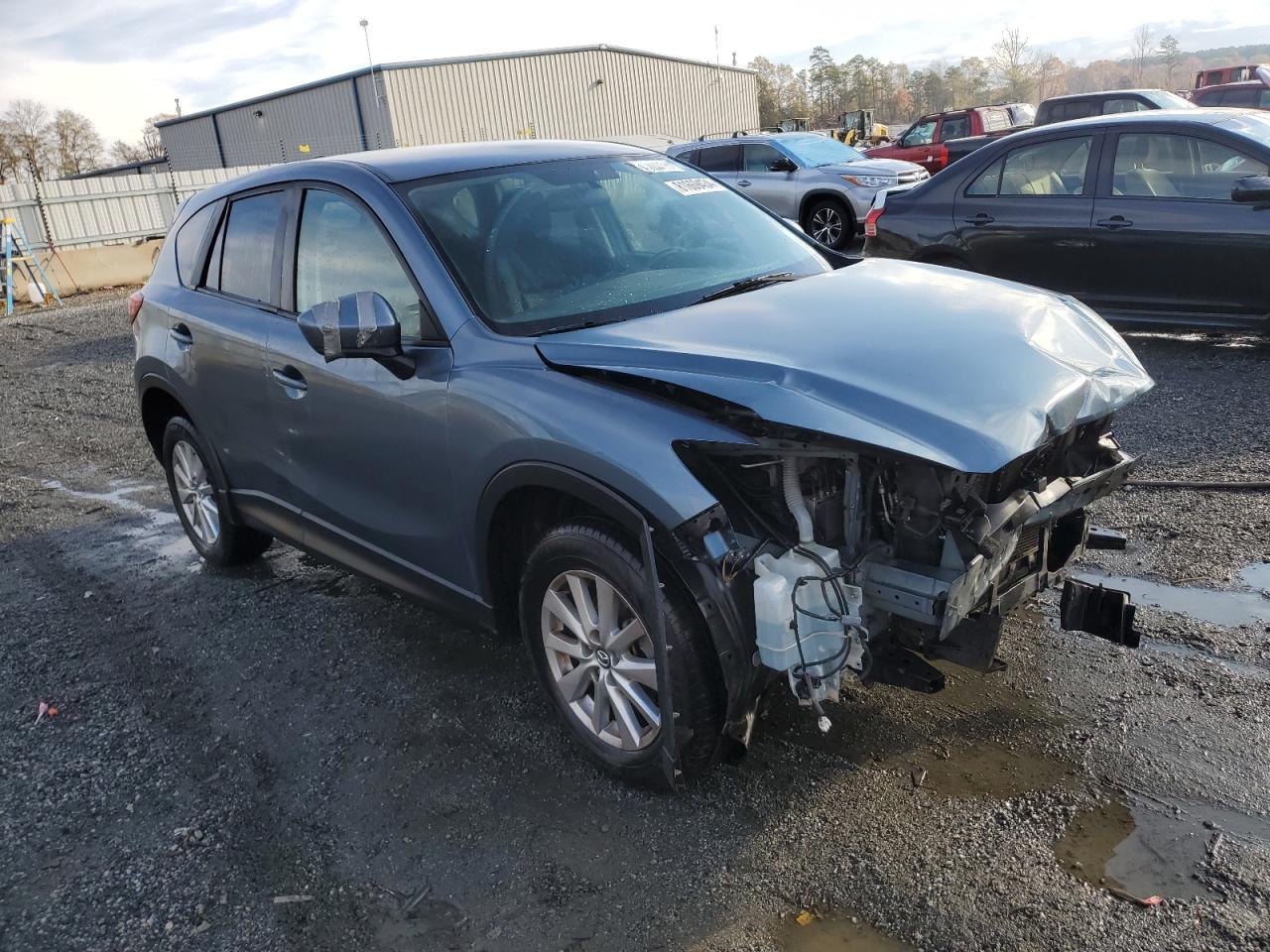 2015 Mazda CX-5 VIN JM3KE2CYXF0459849 Copart auction photo, front end damage thumbnail 4
