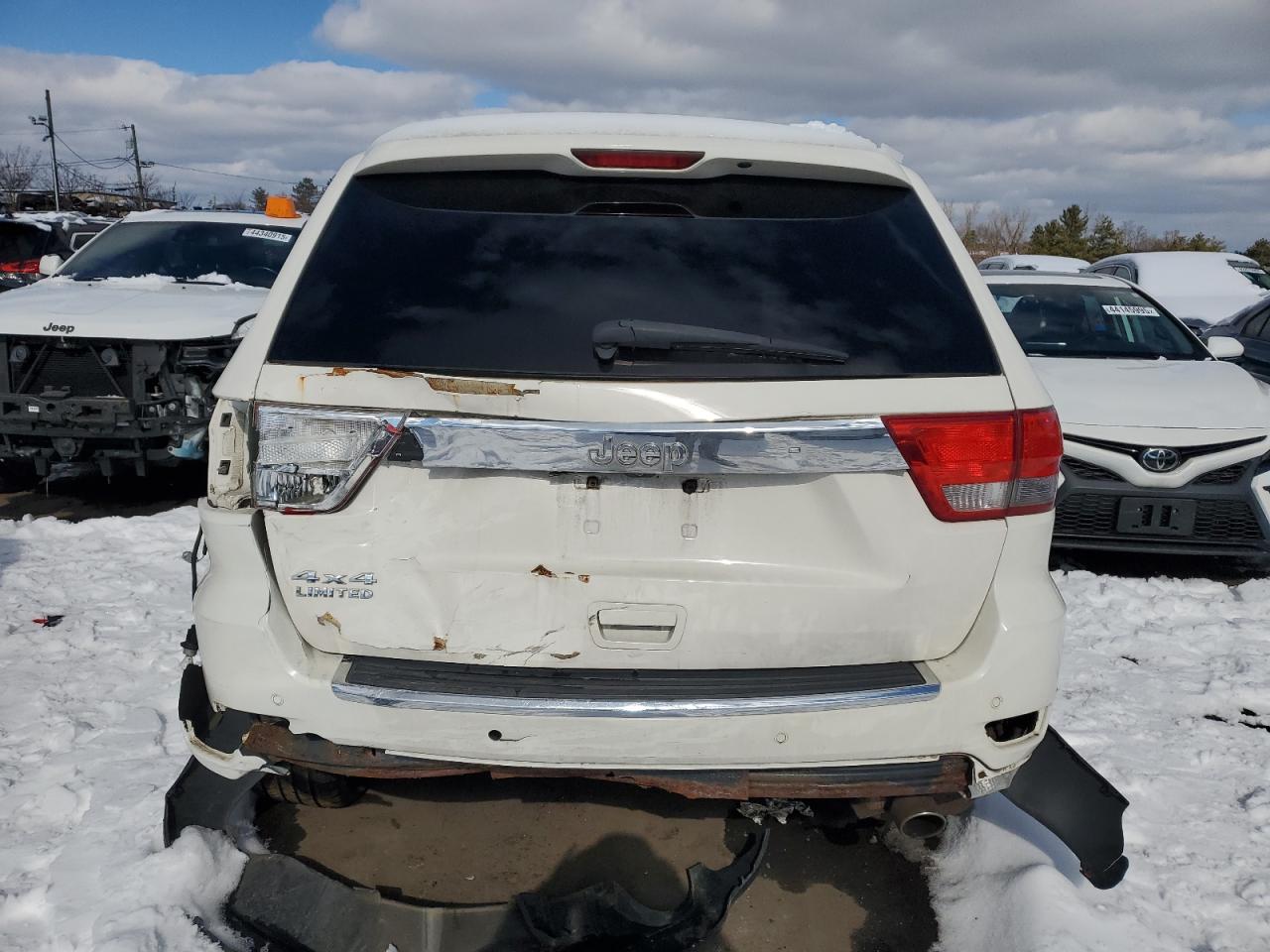 2011 Jeep Grand Cherokee VIN 1J4RR5GG1BC702336 Copart auction photo, all over damage thumbnail 6