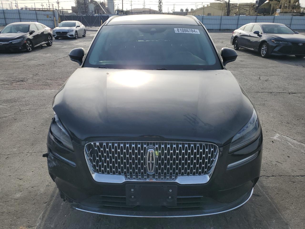 2022 Lincoln Corsair VIN 5LMCJ1C97NUL09404 Copart auction photo, front end / side damage thumbnail 5