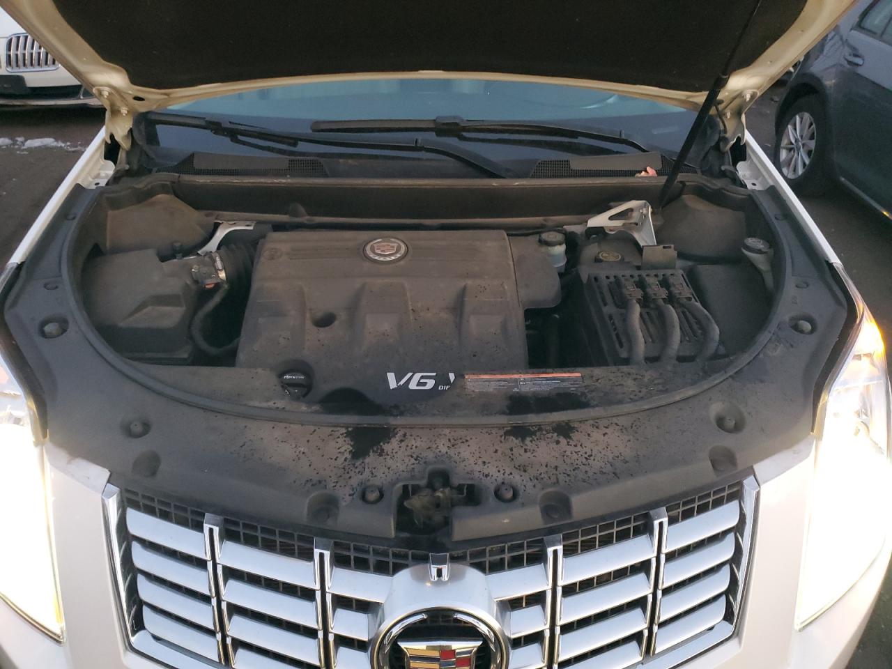 2014 Cadillac SRX VIN 3GYFNEE35ES561493 Copart auction photo, rear end damage thumbnail 12