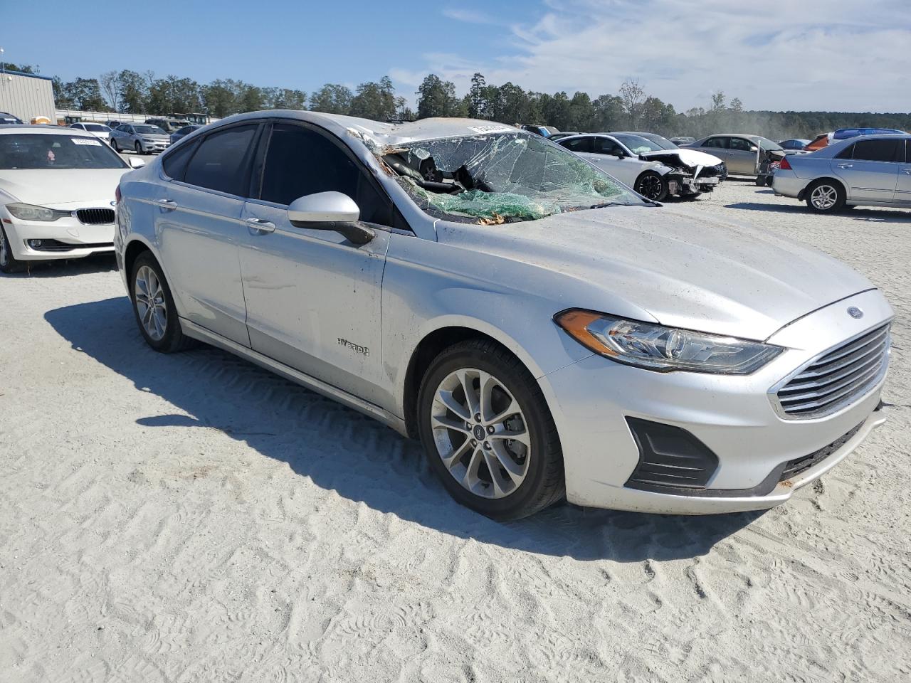 2019 Ford Fusion VIN 3FA6P0LU5KR196689 Copart auction photo, top/roof damage thumbnail 4