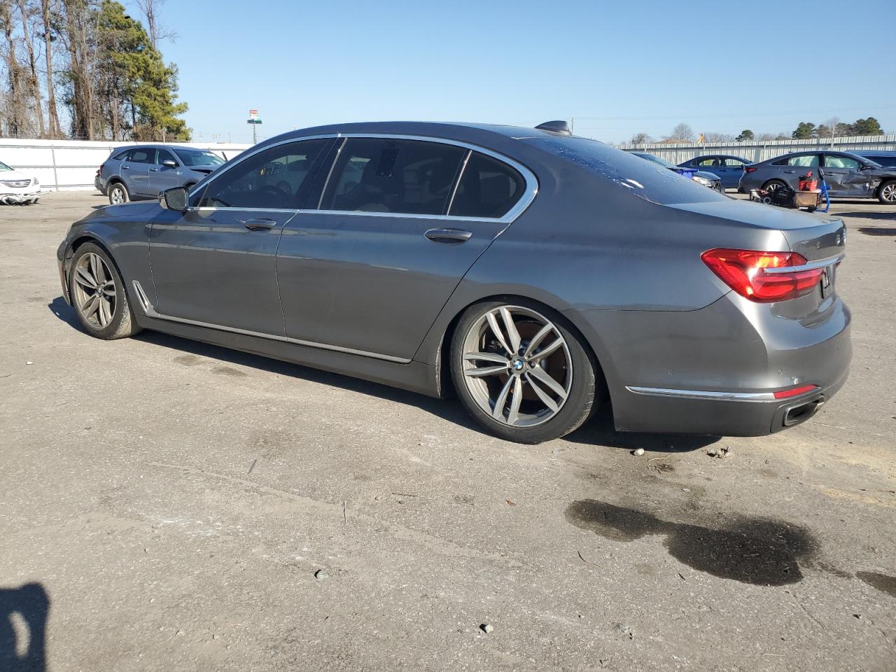 2016 BMW 7er VIN WBA7E2C51GG504431 Copart auction photo, undercarriage damage thumbnail 2