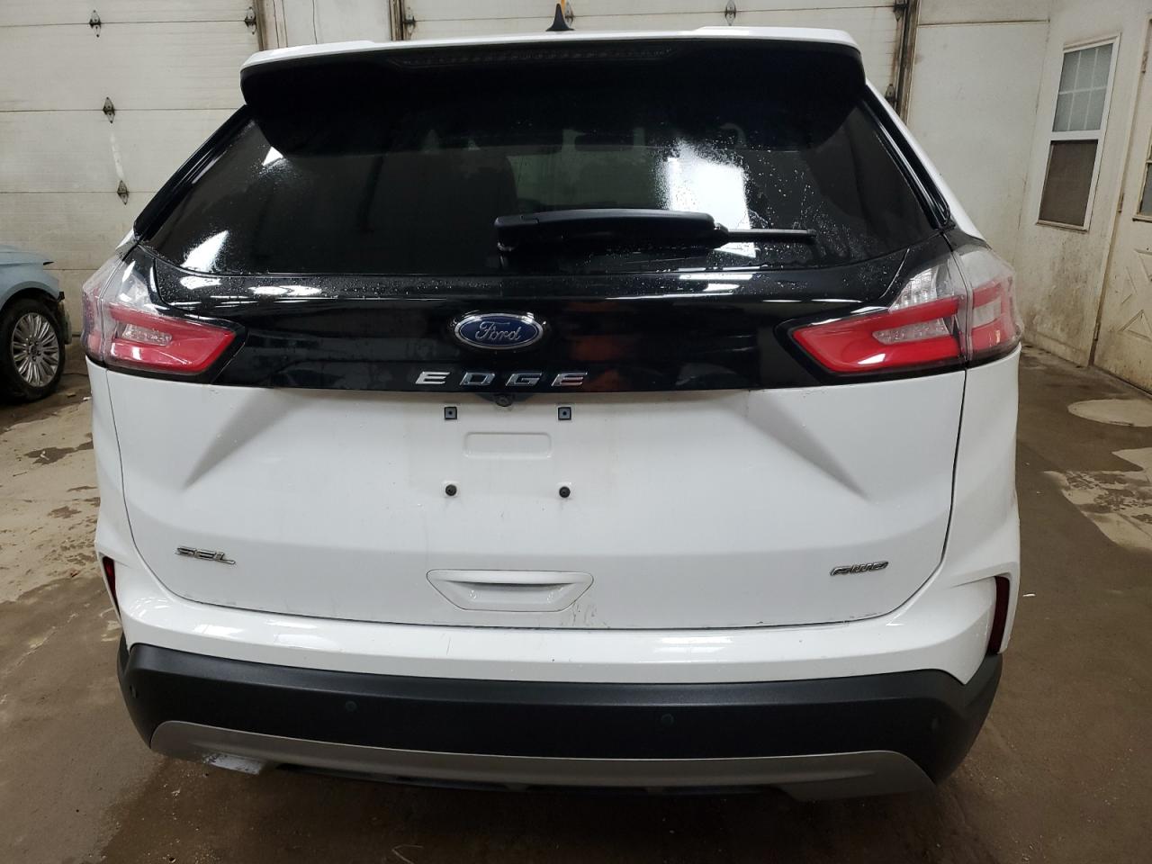 2021 Ford Edge VIN 2FMPK4J90MBA41001 Copart auction photo, front end / minor dent/scratches damage thumbnail 6