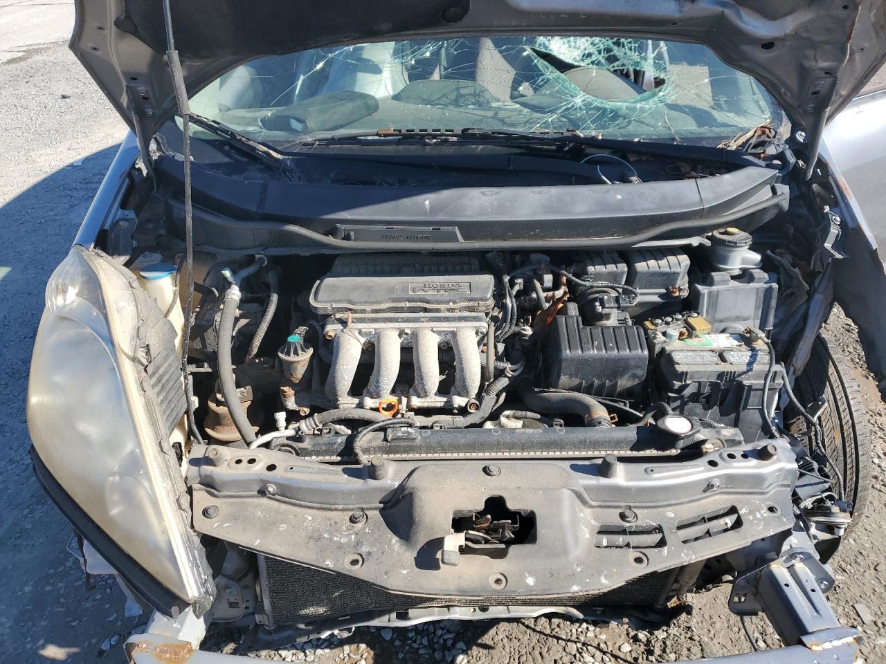 2010 Honda Fit VIN JHMGE8H49AC035575 Copart auction photo, all over damage thumbnail 11