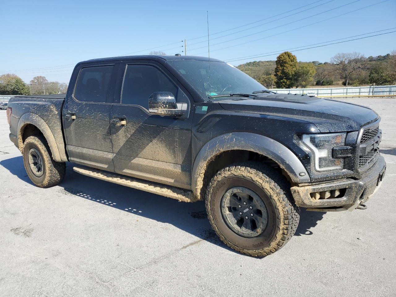 2018 Ford F-150 VIN 1FTFW1RGXJFB98955 Copart auction photo, undercarriage / minor dent/scratches damage thumbnail 4
