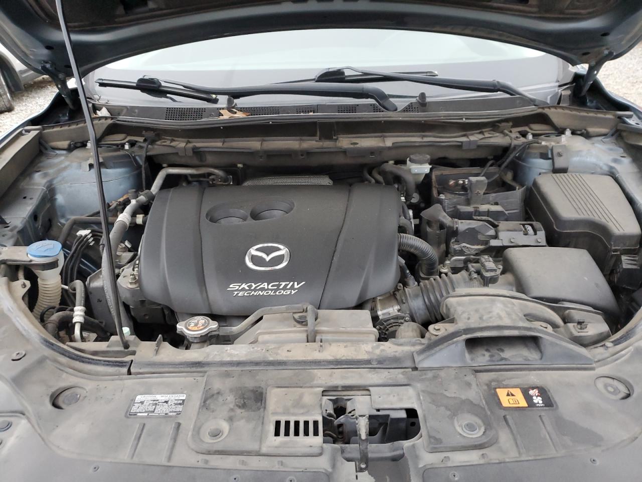 2015 Mazda CX-5 VIN JM3KE4CY1F0466796 Copart auction photo, all over damage thumbnail 13