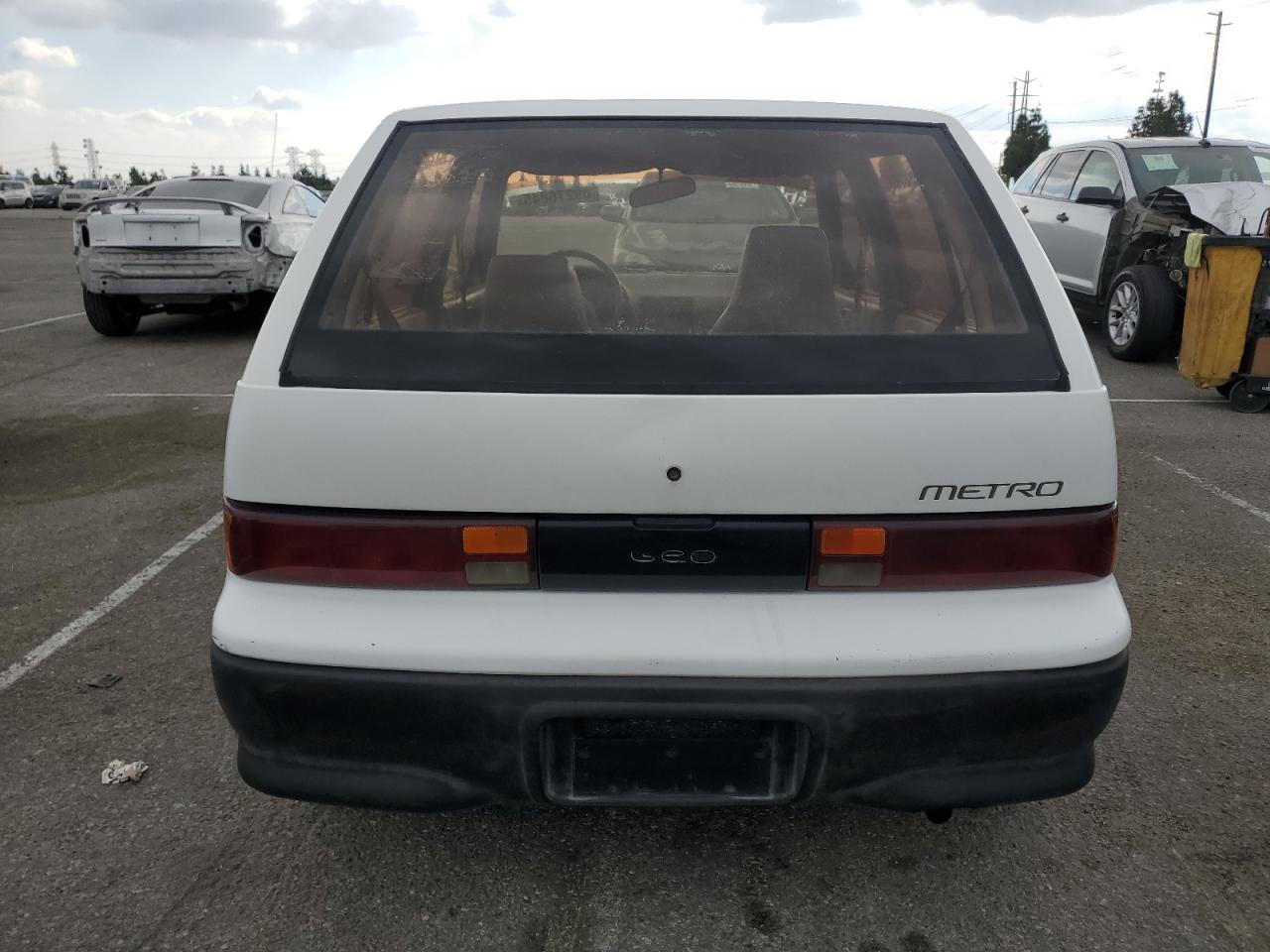 1993 GEO Metro VIN 2C1MR6469P6700123 Copart auction photo, minor dent/scratches damage thumbnail 6
