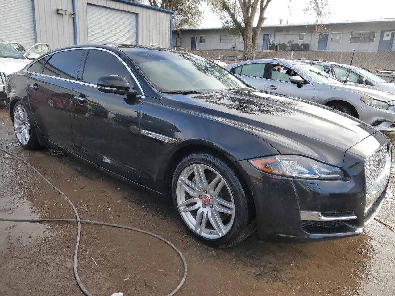 2017 Jaguar XJ VIN SAJWJ2GD9H8W07458 Copart auction photo, water/flood damage thumbnail 4
