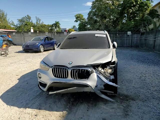 2018 BMW X1 VIN WBXHU7C35J3F04295 Copart auction photo, front end damage thumbnail 12