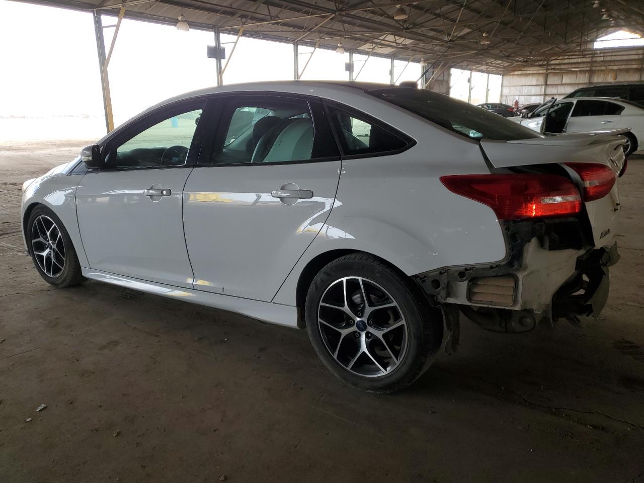 2016 Ford Focus VIN 1FADP3F28GL315411 Copart auction photo, rear end damage thumbnail 2