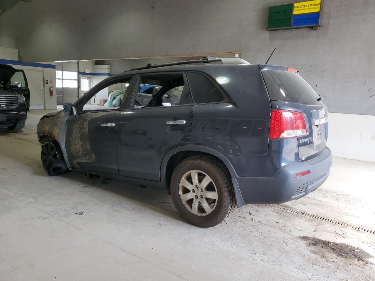 2012 KIA Sorento VIN 5XYKT4A66CG276899 Copart auction photo, burn / burn - interior damage thumbnail 2