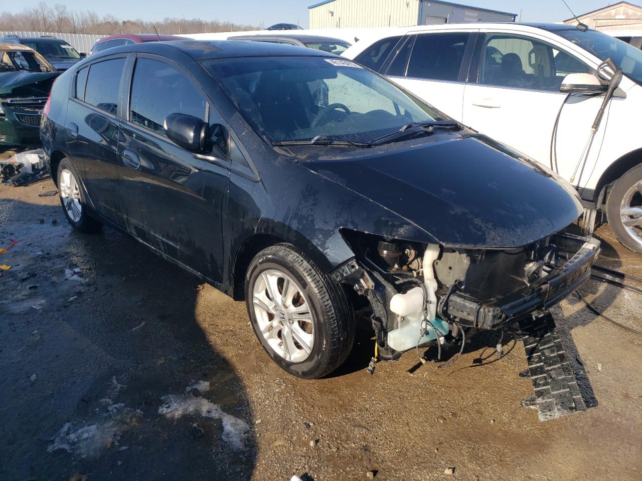 2010 Honda Insight VIN JHMZE2H73AS002657 Copart auction photo, front end damage thumbnail 4